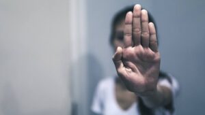 Grade 18 official accused of harassing a woman by photographing