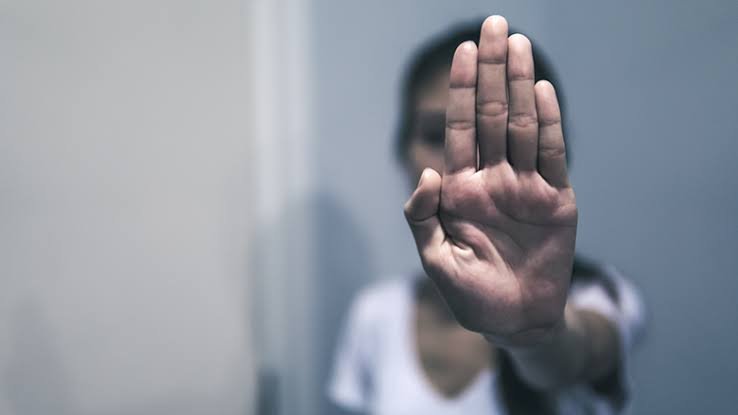 Grade 18 official accused of harassing a woman by photographing