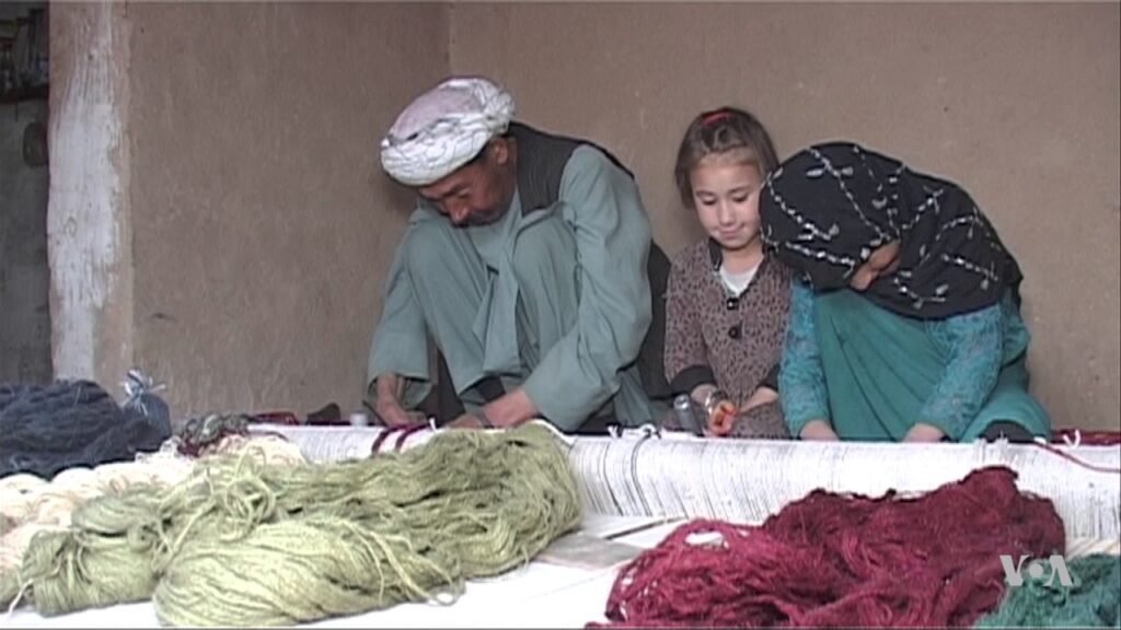 Afghan families find carpet