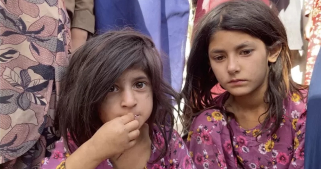 Afghans give drugs to hungry children to help them sleep