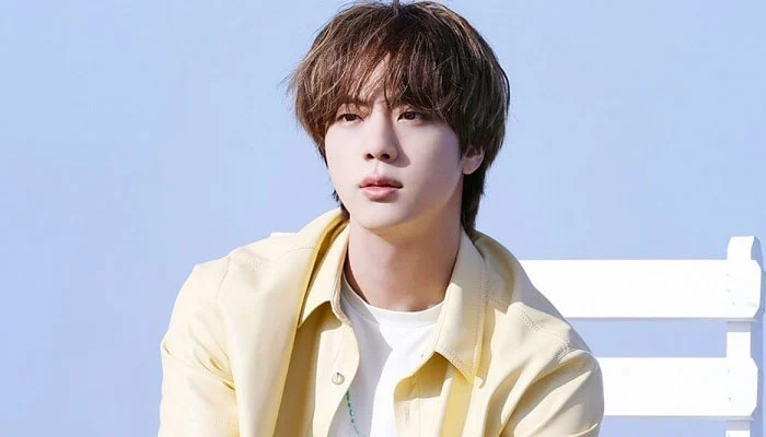 Jin of the K-pop group BTS makes a request to his fans via a pre-recorded video. He began his service in December of last year.