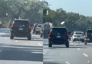 Watch: Currency notes rain down on motorway amid economic crisis