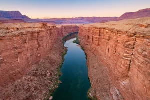There are several landforms that are created by the action of running water.