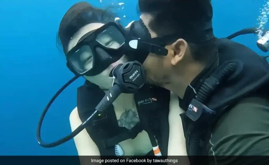 Diving instructor detained for kissing Chinese tourist underwater