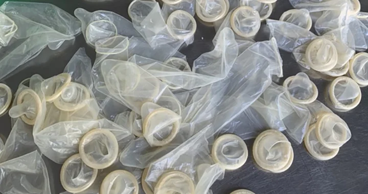 Who is mailing used condoms to Australian women?