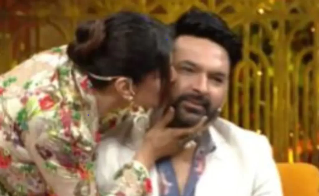Video: Raveena Tandon kisses Kapil Sharma on show
