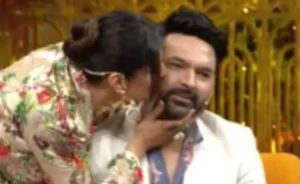 Video: Raveena Tandon kisses Kapil Sharma on show