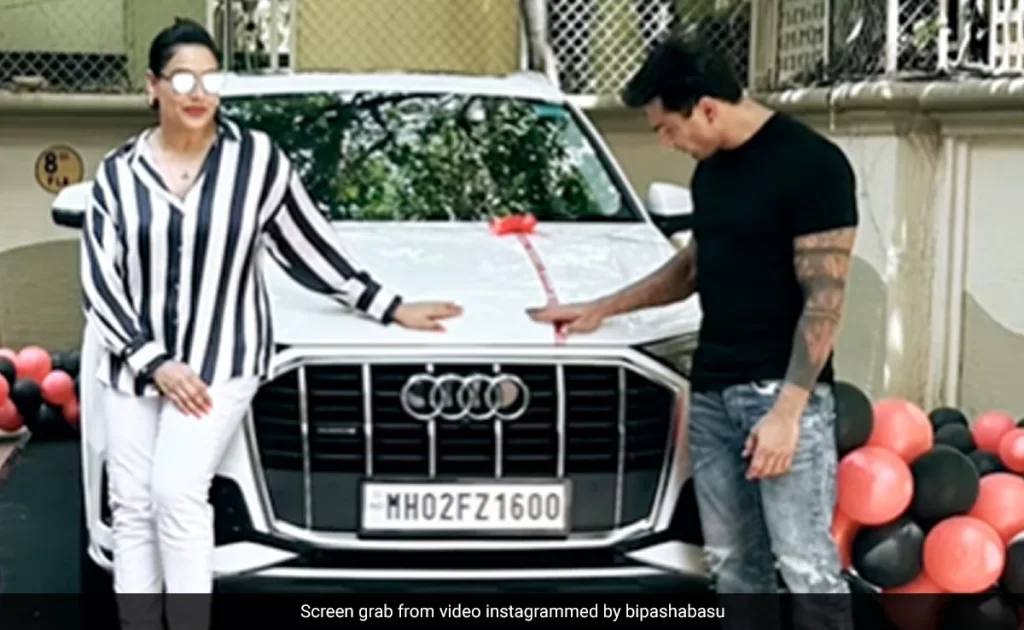 Bipasha Basu and Karan Singh Grover buy new AudiQ7