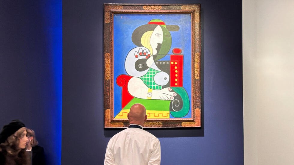 Historic Picasso painting "Femme à la montre" fetches record $139 Million