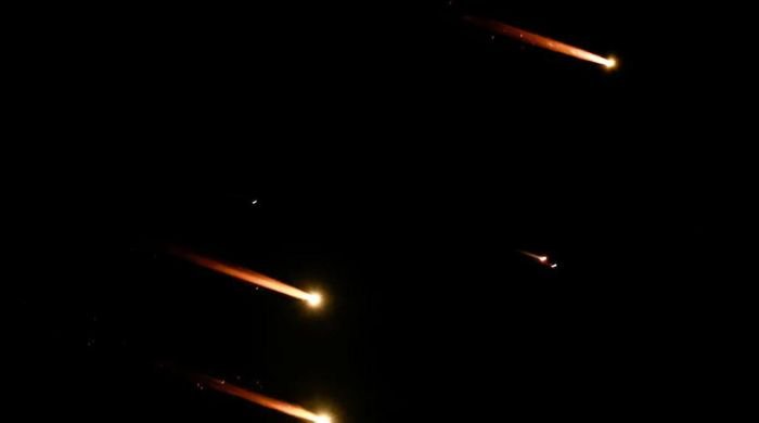 Iran Guards threaten "crushing attacks" if Israel responds to missiles