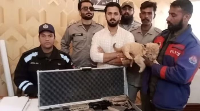 TikToker Rajab Butt arrested for keeping lion cub and firearm display