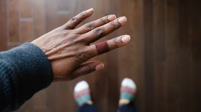 Indian man chops off four fingers to avoid quitting job